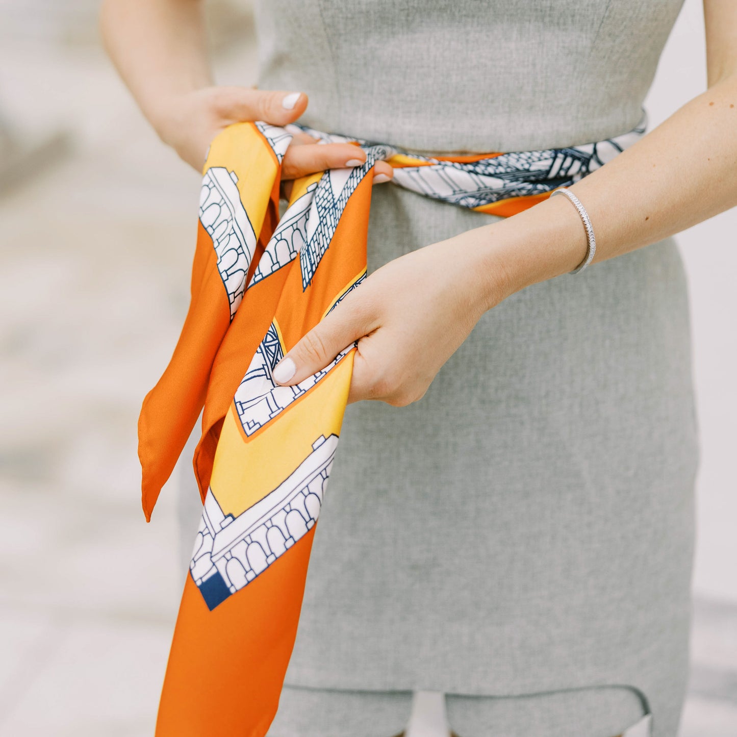THE CHARLOTTESVILLE TUNDY SCARF IN ORANGE